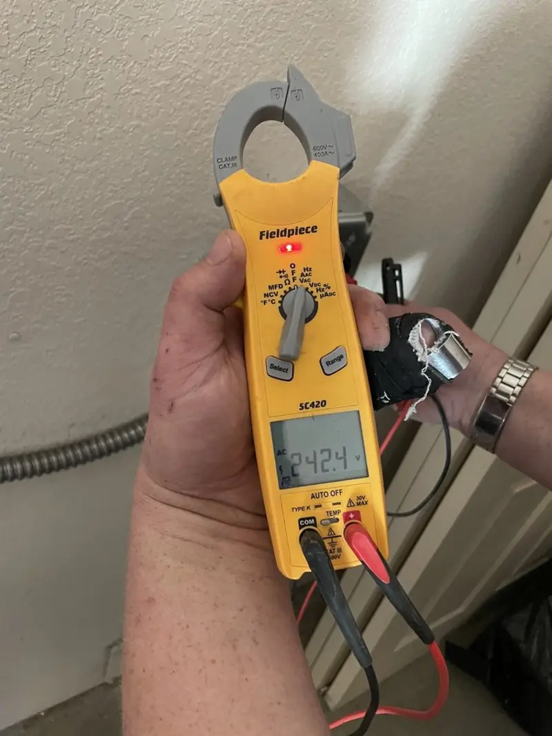 Voltage testing with clamp meter during Circuit Breaker Repair in Blue Ash